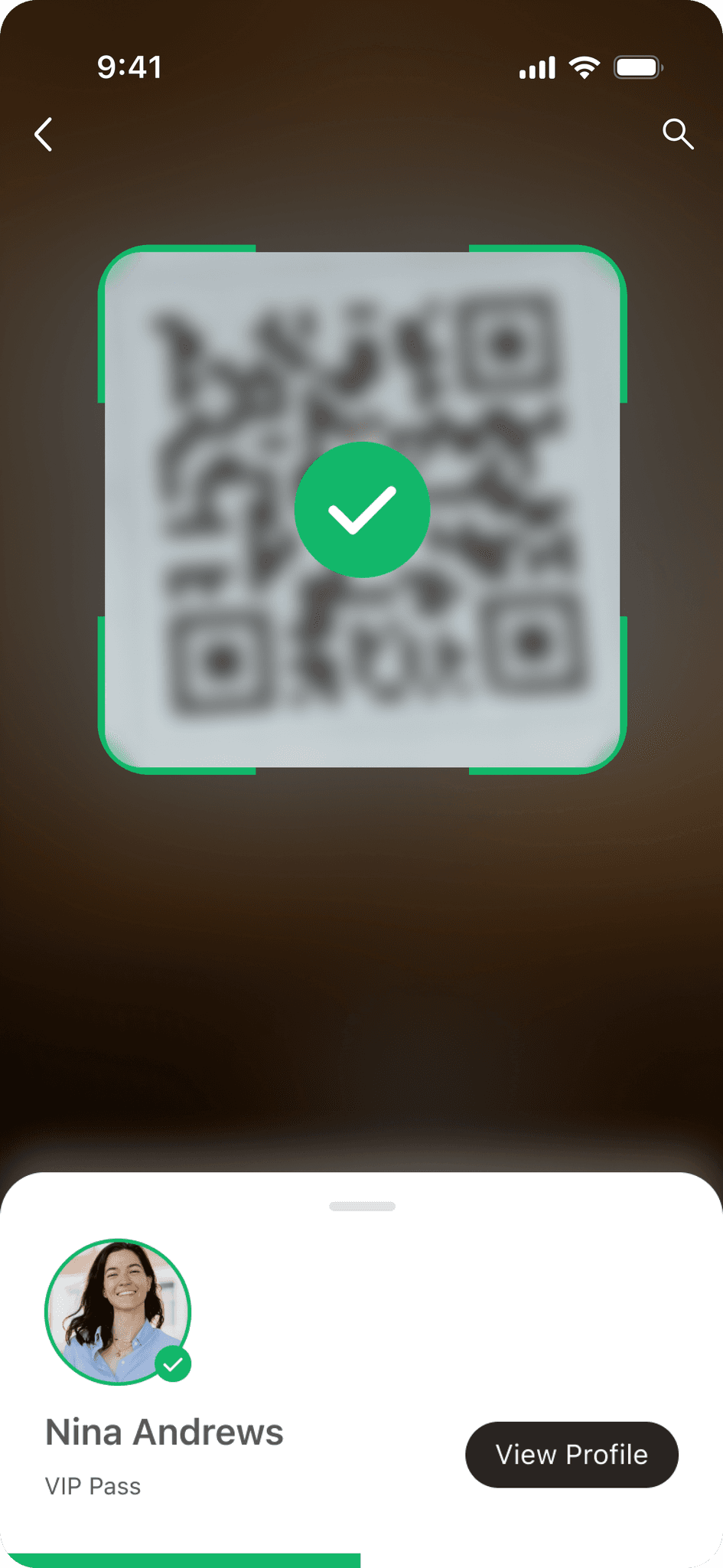 Self check-in screen showing a scanned QR code confirmed with a green tick and the attendee's VIP pass