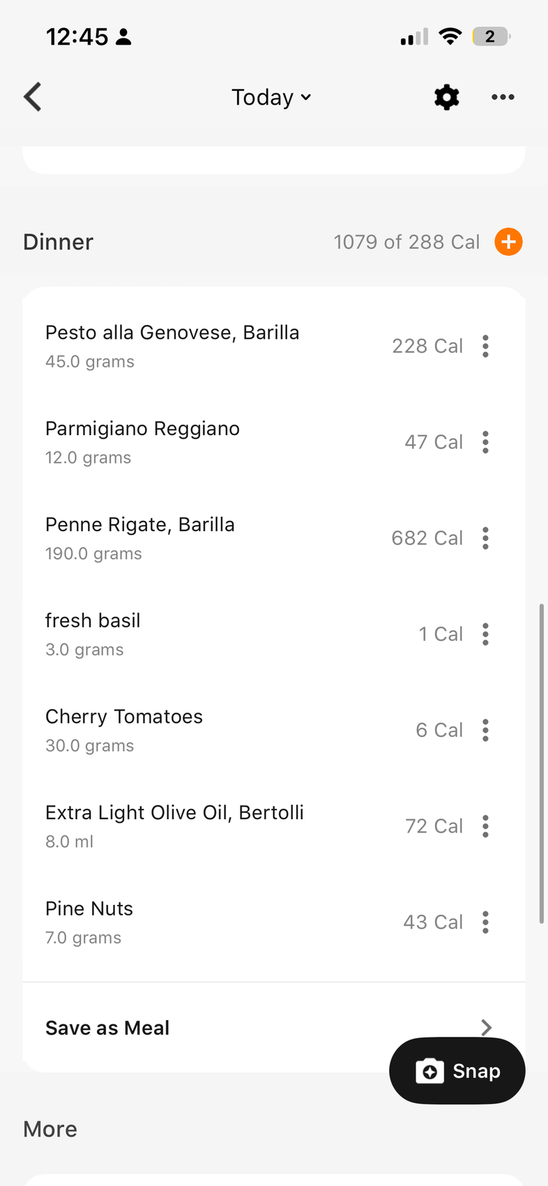 Daily log expanded to show the full ingredient list under a single saved meal